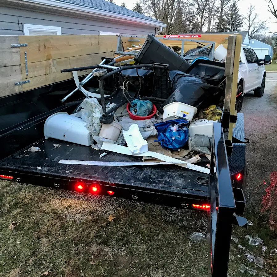 Roll-off dumpster delivered to a residential driveway in Balm